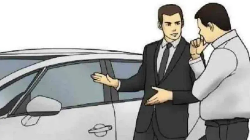 Car Salesman Slaps Roof of Car