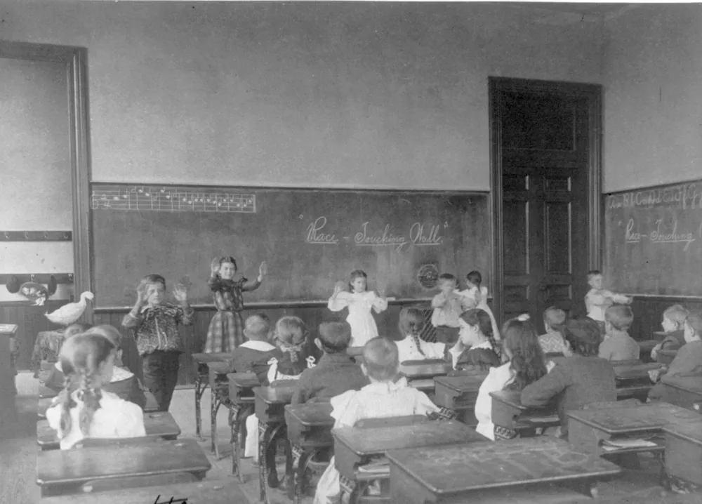 1899 Classroom Hands Up